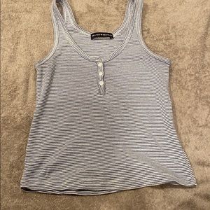 A stripped blue and white Brandy tank
